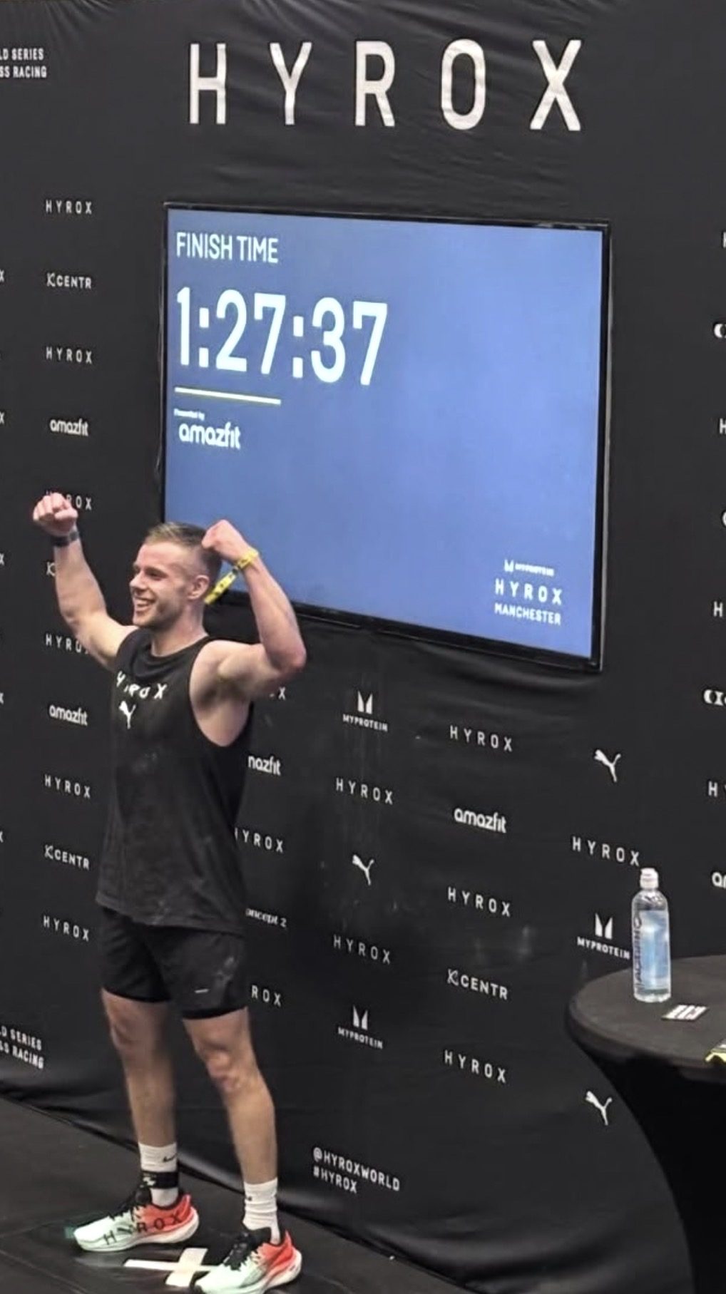 Dom Sharpe celebrating a 1:27:37 finish time at HYROX Manchester